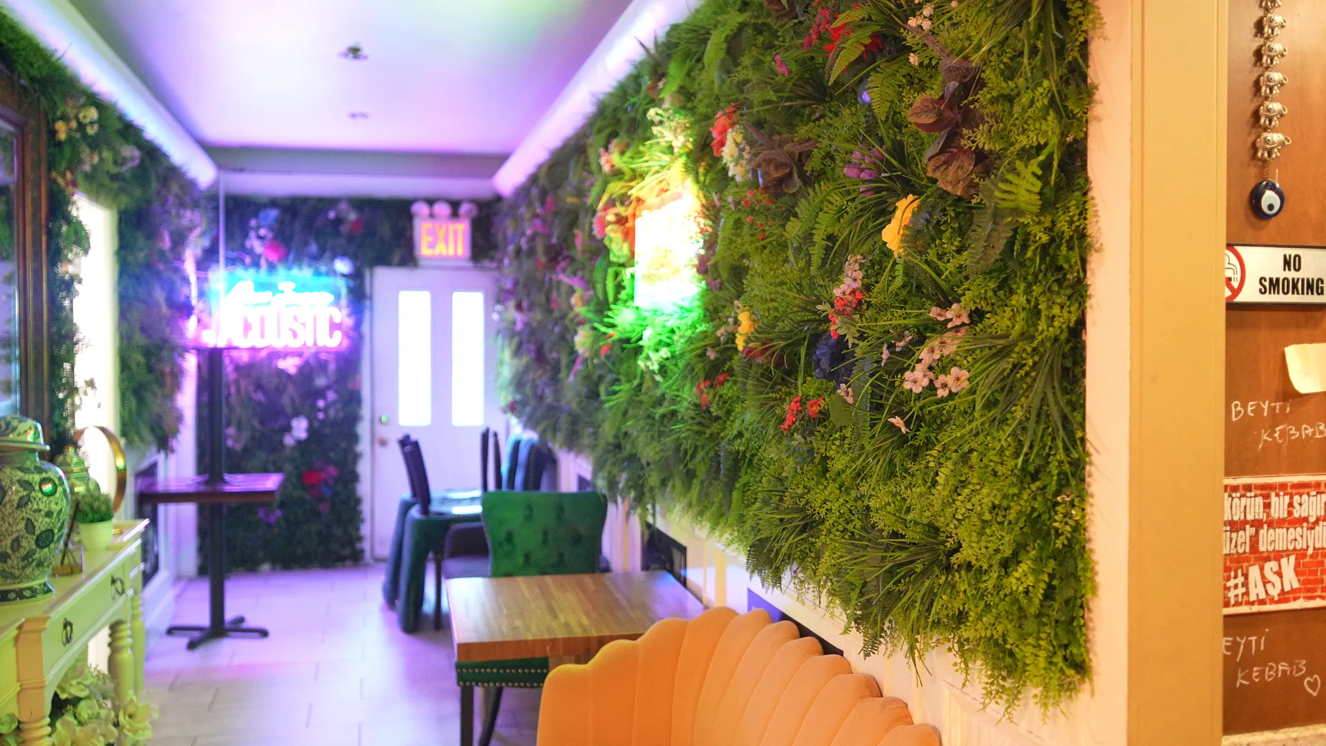 Lush greenery and floral details in the venue lounge